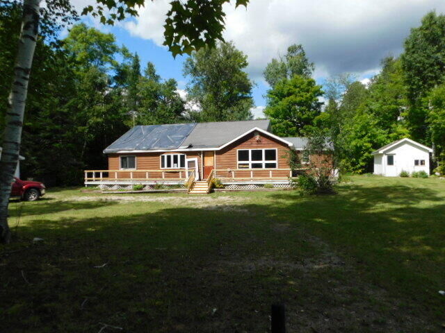 Property Photo:  29098 W H-40  MI 49760 