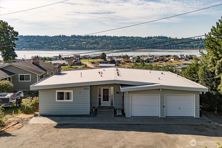 Property Photo: 8347 Sandy Hook Drive WA 98236