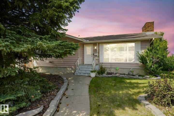 Property Photo: 1408 76 Street NW AB T6K 2R9