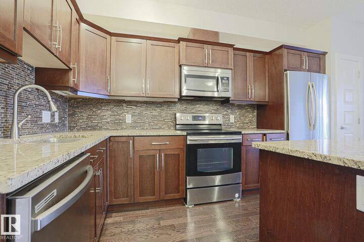 Property Photo: 10530 56 Avenue NW 205 AB T6H 0X7