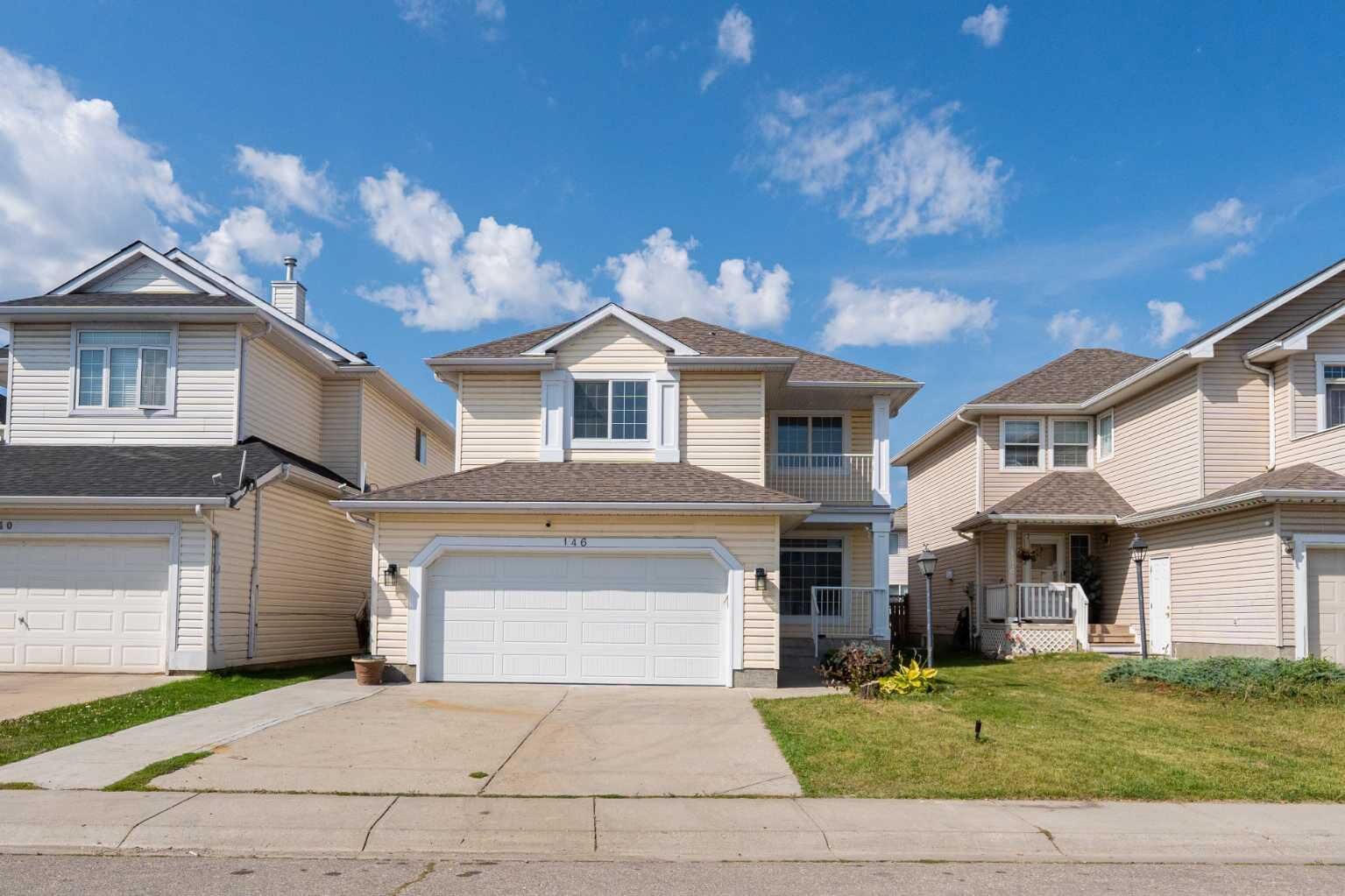 Property Photo: 146 Coral Reef Close NE AB T3J 3Y6