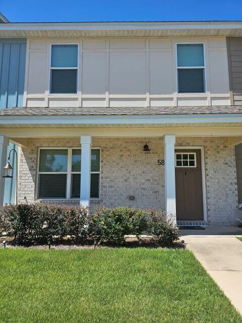Property Photo:  400 Mattie M Kellyy Boulevard 58  FL 32541 