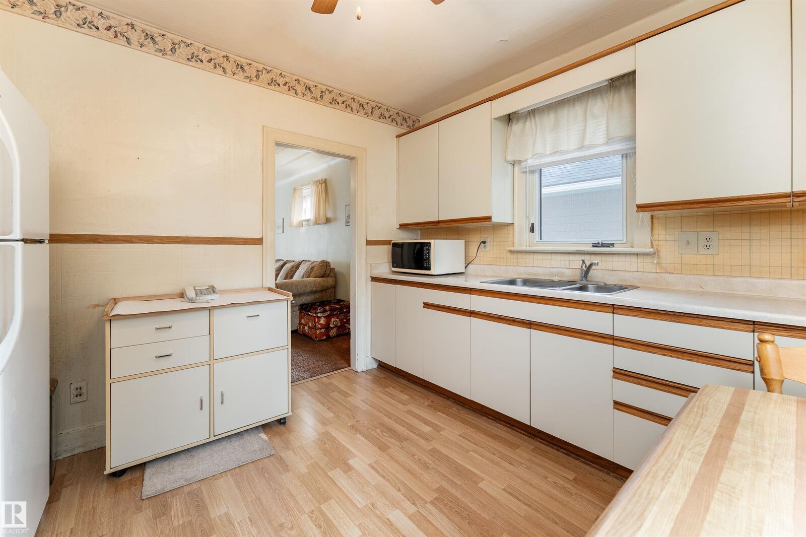 Property Photo: 11438 65 Street NW AB T5W 4K8