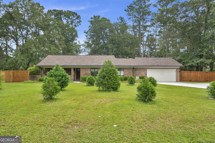 Property Photo:  208 S Topi Trail  GA 31313 
