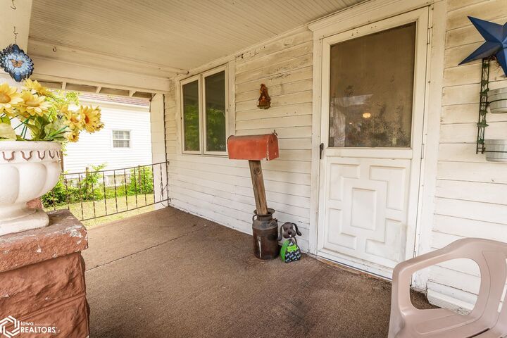 Property Photo:  107 S 5th Street  IA 50158 