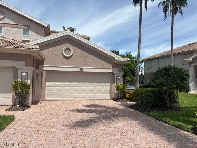 Property Photo: 13960 Lake Mahogany Boulevard 1922 FL 33907