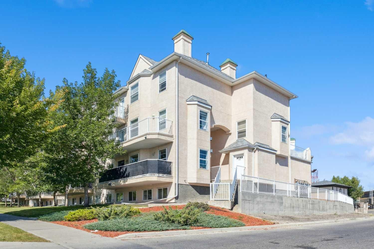 Property Photo: 50 Westland Road 218 AB T1S 2G4