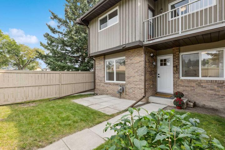 Property Photo: 1055 72 Avenue NW 111 AB T2K 5S4