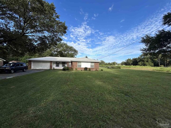 Property Photo: 6067 Anderson Ln FL 32570