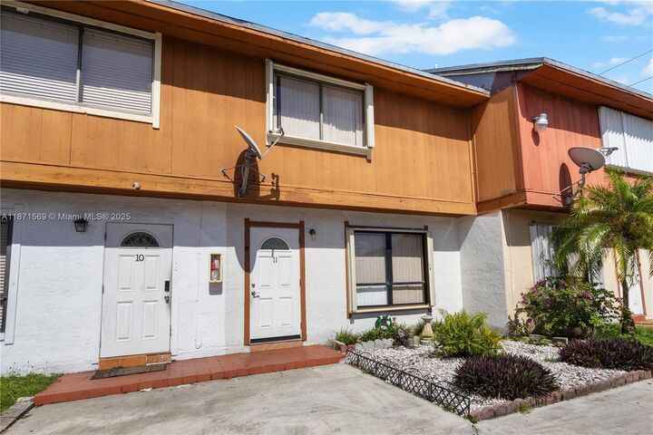 Property Photo:  8360 NW 8th St 11-2  FL 33126 