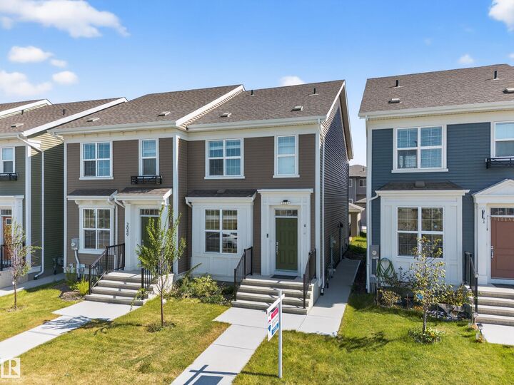 Property Photo: 2047 Maple Road NW AB T6T 2T1