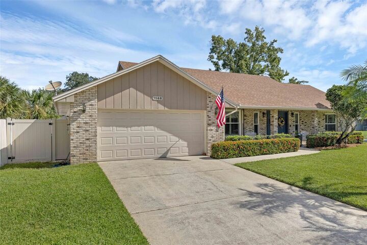 Property Photo:  1148 Climbing Rose Drive  FL 32818 