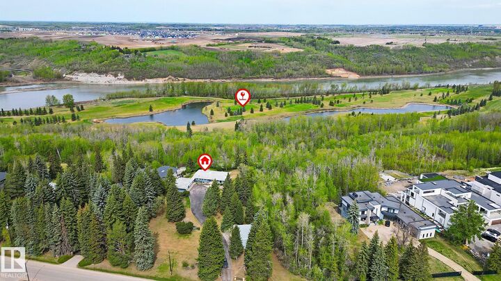 Property Photo: 140 Windermere Drive NW AB T6W 0S4