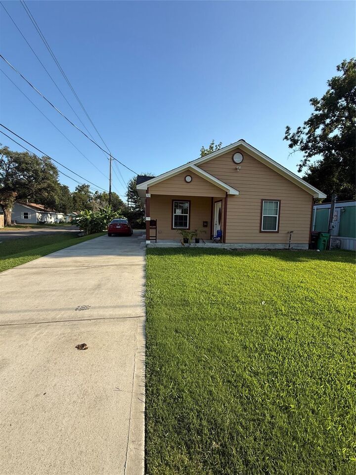 Property Photo:  210 E Homan Street  TX 77520 