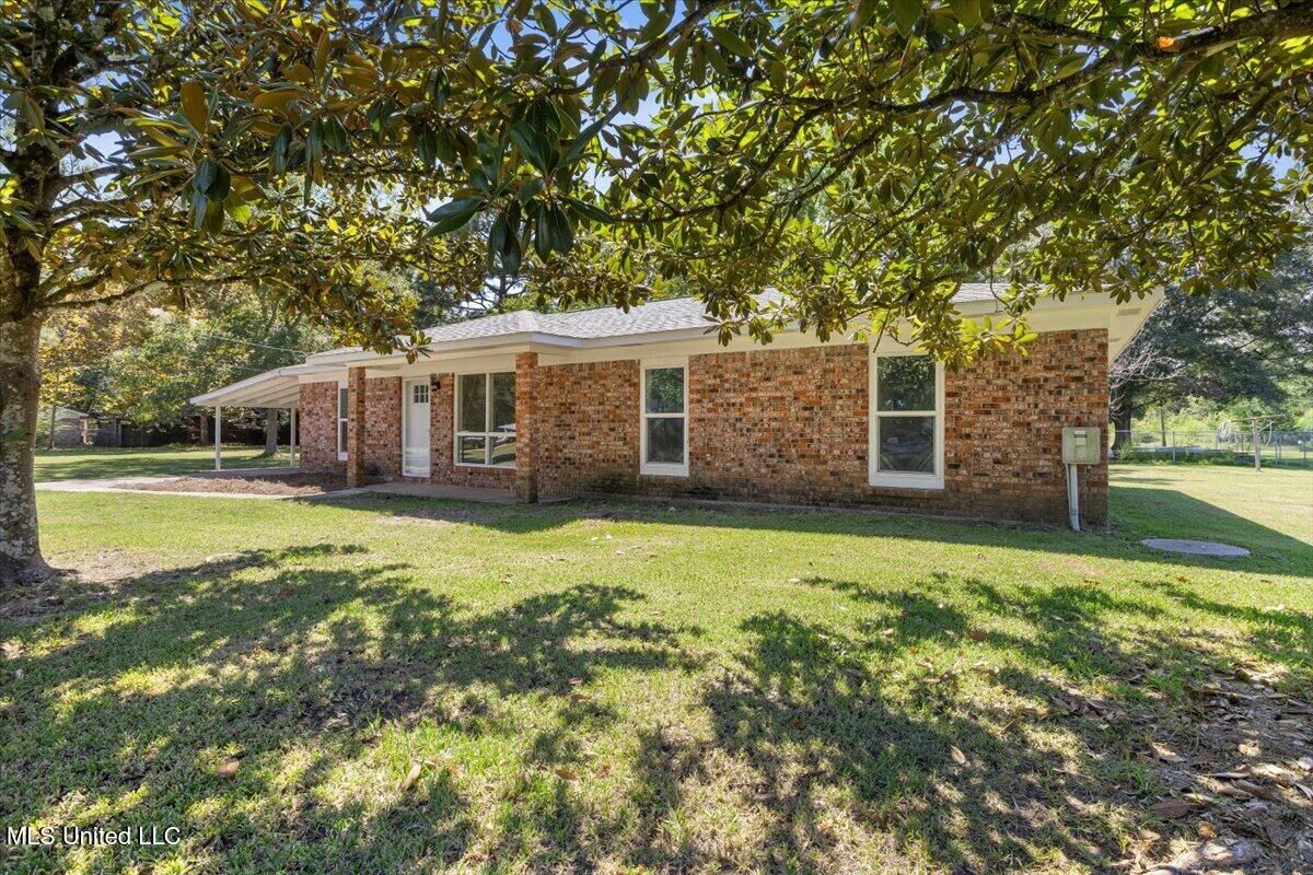 Property Photo:  10413 Charpentier Drive  MS 39562 