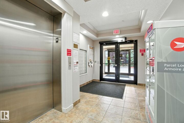 Property Photo: 9819 96A Street NW 305 AB T6A 4A2