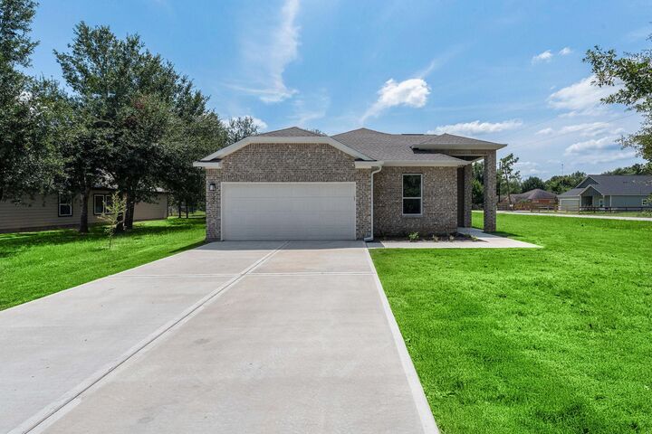 Property Photo:  702 Azalea Street  TX 77484 