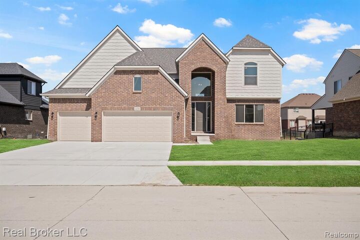 Property Photo: 35689 Windridge Drive MI 48047 5852