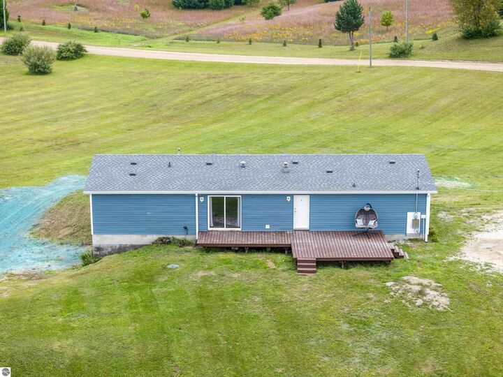Property Photo:  848 SW Prairie Lane  MI 49646 
