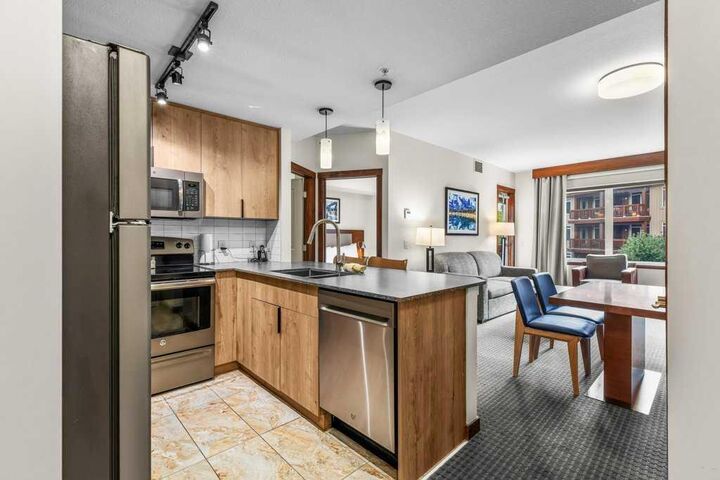 Property Photo: 190 Kananaskis Way 231 AB T1W 3K5