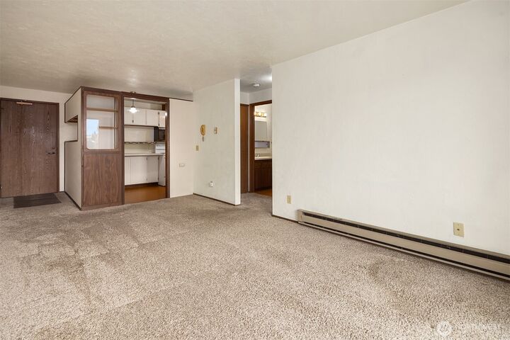 Property Photo:  2100 N 106th Street 402  WA 98133