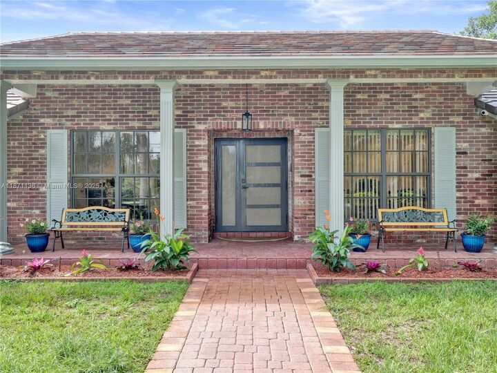 Property Photo:  11300 Shady Lane  FL 33325 