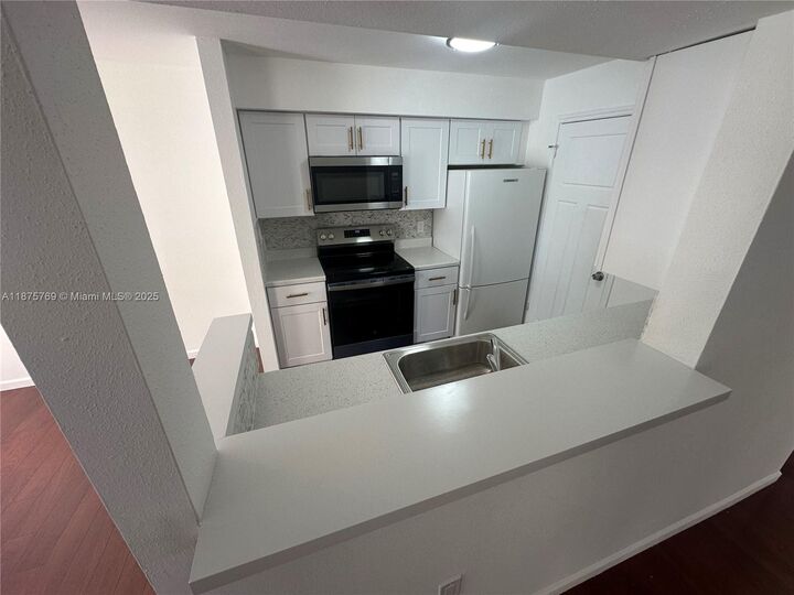 Property Photo:  2341 NW 33rd St 409  FL 33309 