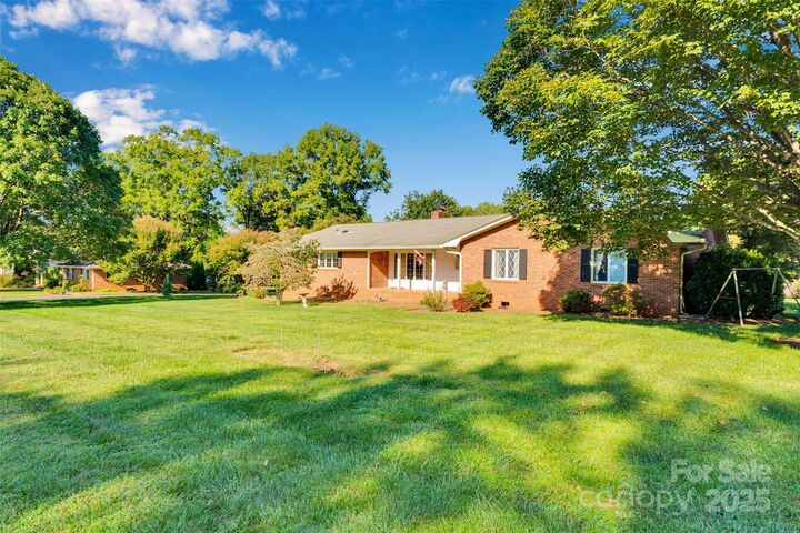 Property Photo:  10701 Washam Potts Road  NC 28031 