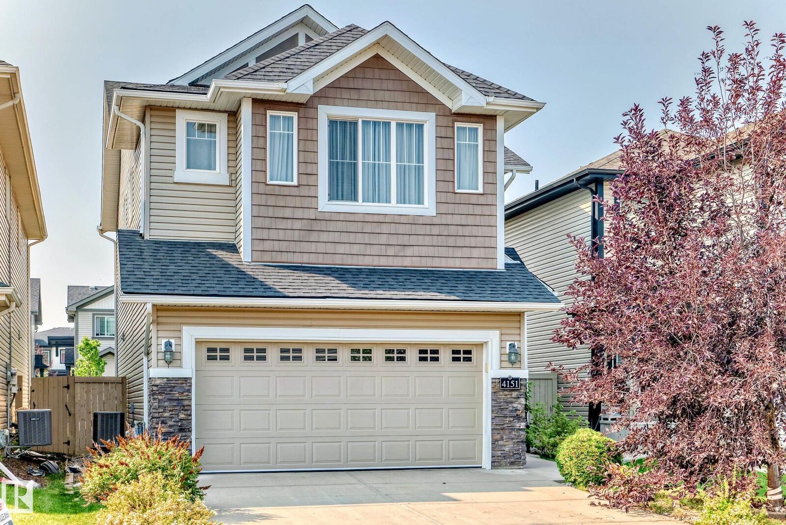 Property Photo: 4151 Alexander Way SW AB T6W 2C8