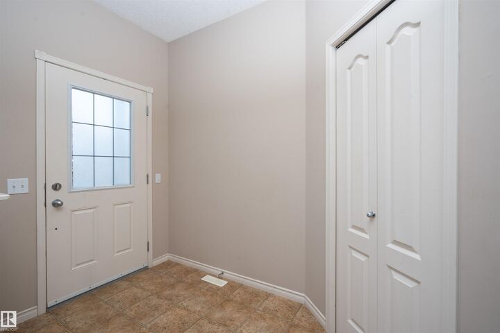 Property Photo:  21215 59ave NW  AB T6M 0H5 