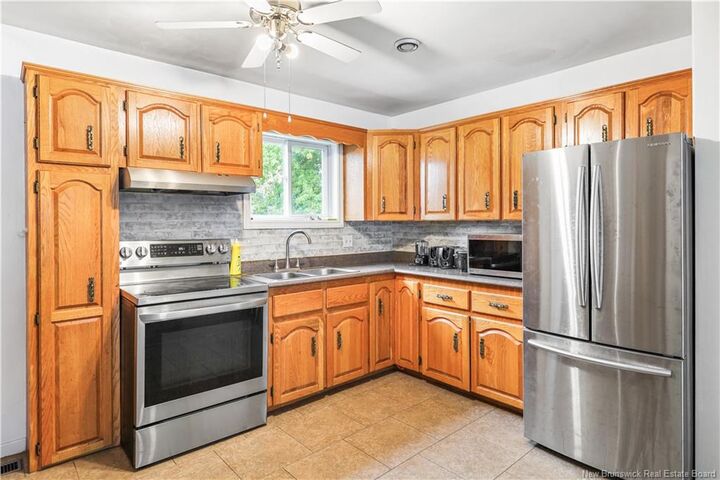 Property Photo:  18 Mitchner Avenue  NB E1C 7N6 