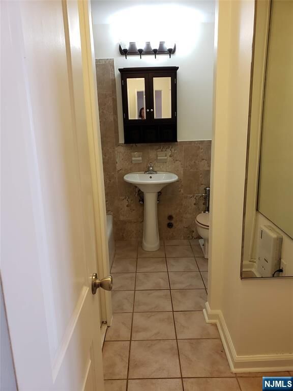 Property Photo: 6050 Kennedy Boulevard 12D NJ 07093