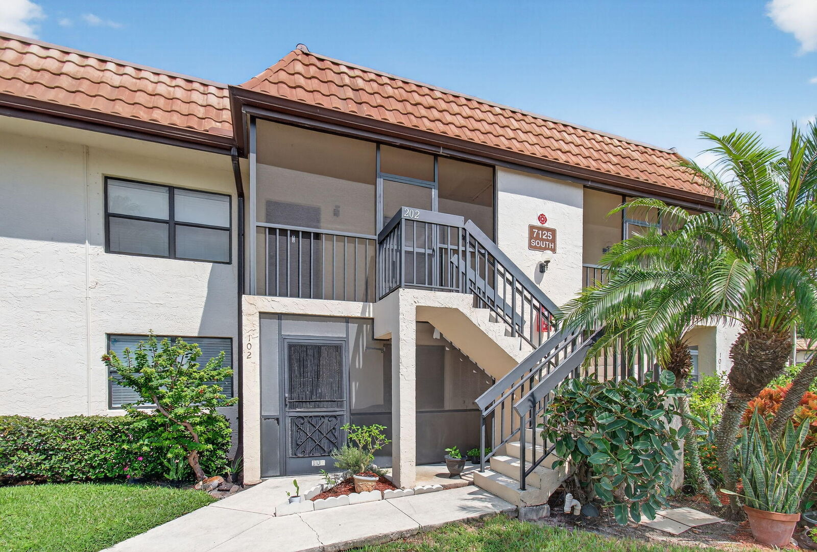 Property Photo: 7125 Golf Colony Court 202 FL 33467