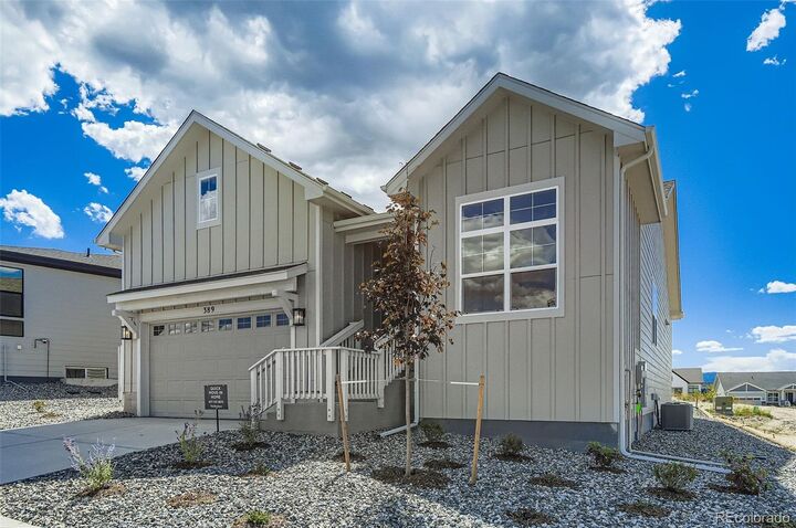 Property Photo:  389 Basin Daisy Street  CO 80104 