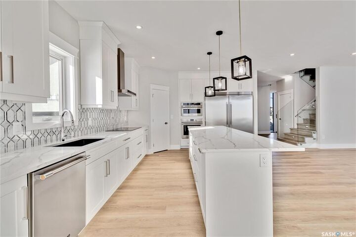 Property Photo:  331 Woolf Bay  SK S7W 1E5 