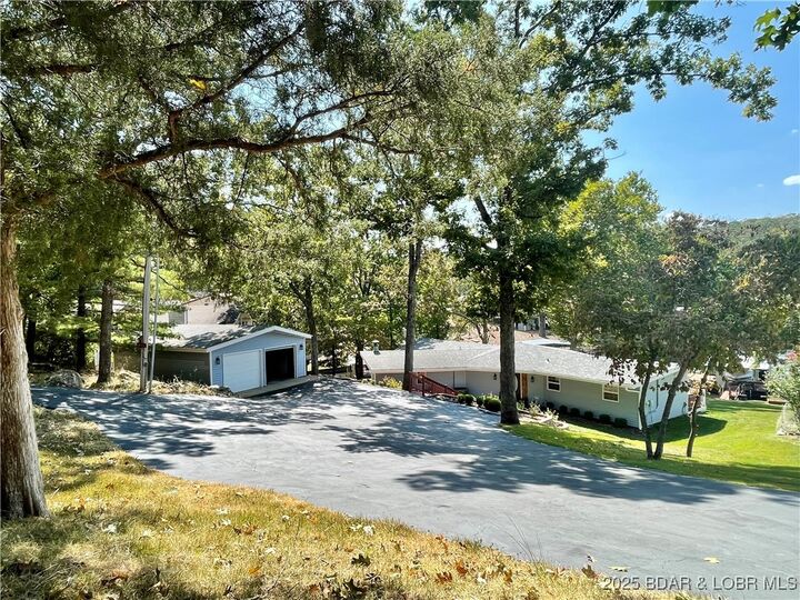 Property Photo:  6451 Running Deer Drive  MO 65065 