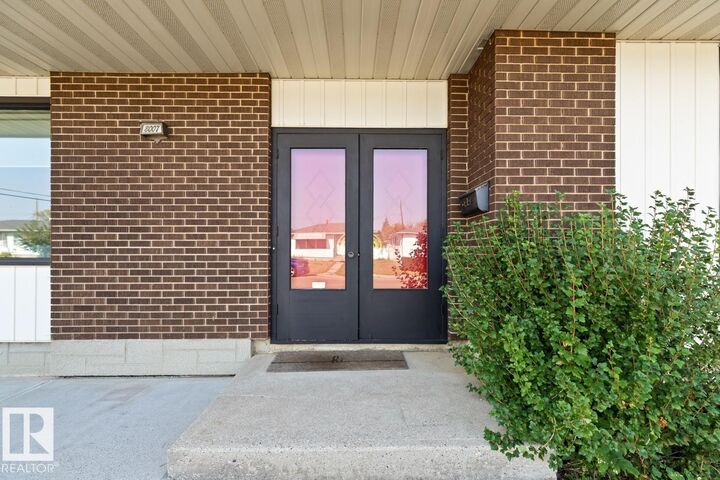Property Photo:  8007 128 Avenue NW  AB T5C 1T8 