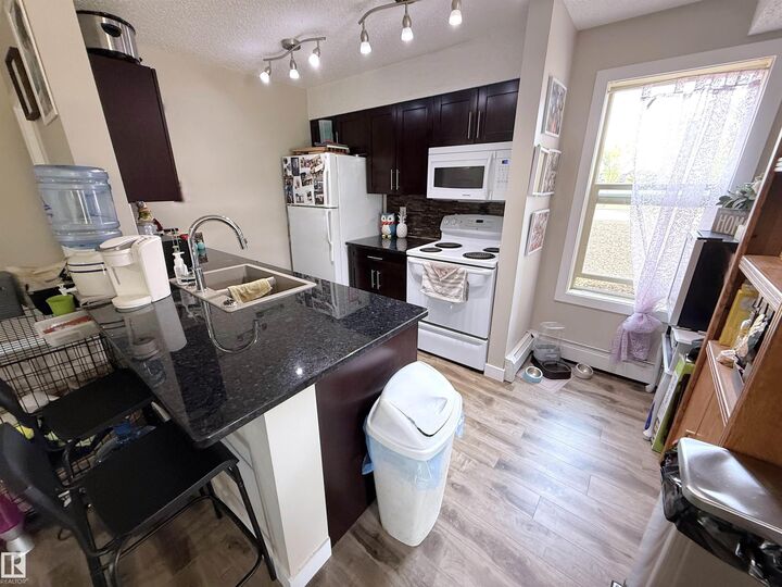 Property Photo:  11803 22 Avenue SW 101  AB T6W 2R9 