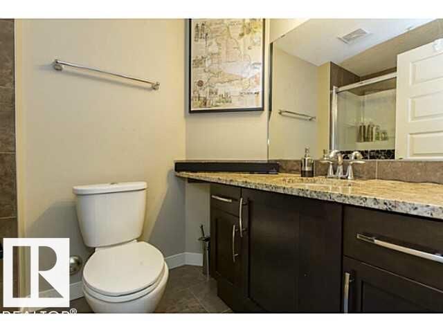 Property Photo:  10530 56 Av NW NW 113  AB T6H 0X7 
