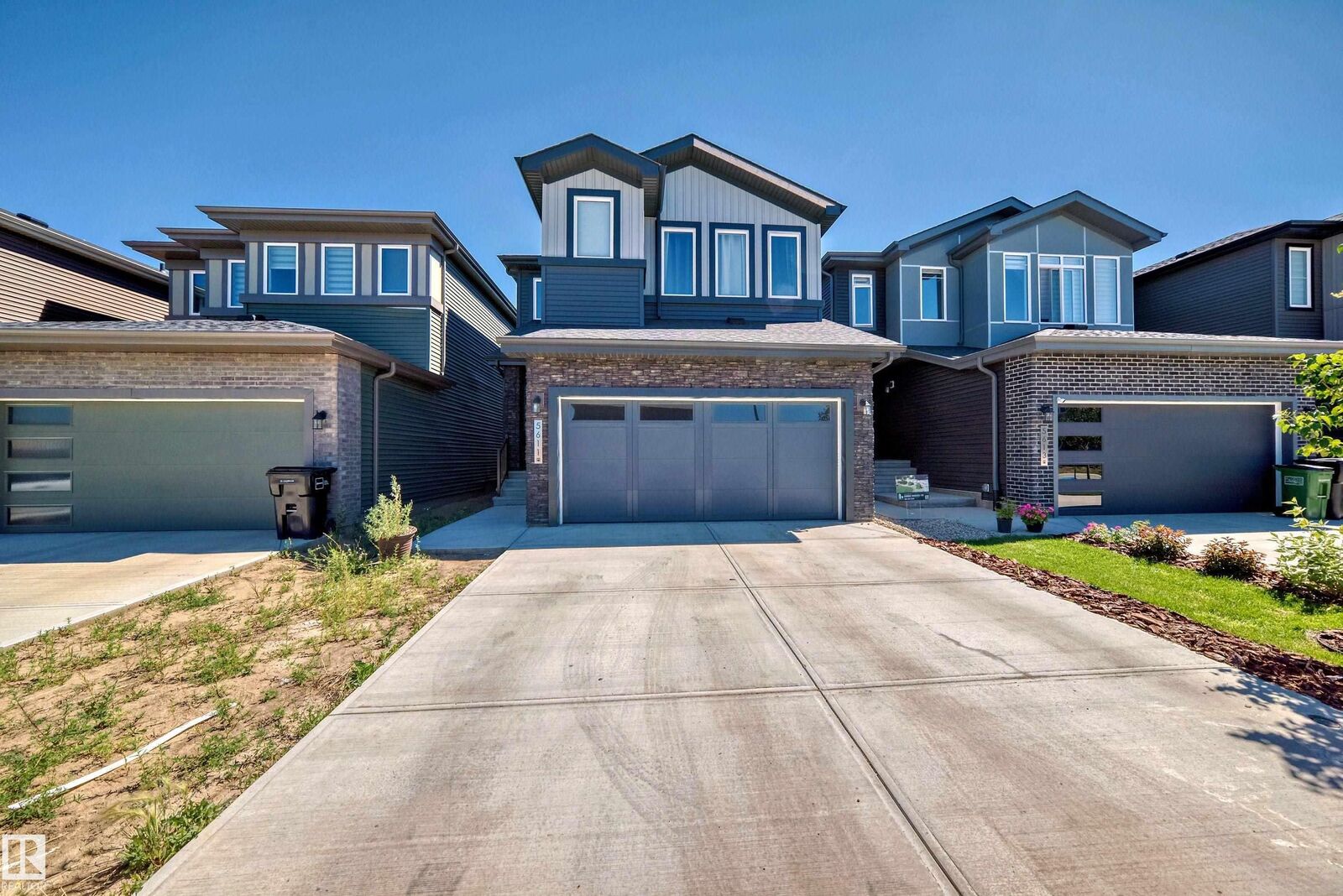 Property Photo:  5611 Kootook Place SW  AB T6W 4Z5 