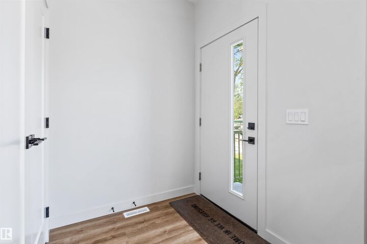 Property Photo:  12037 124 Street NW  AB T5L 0M8 