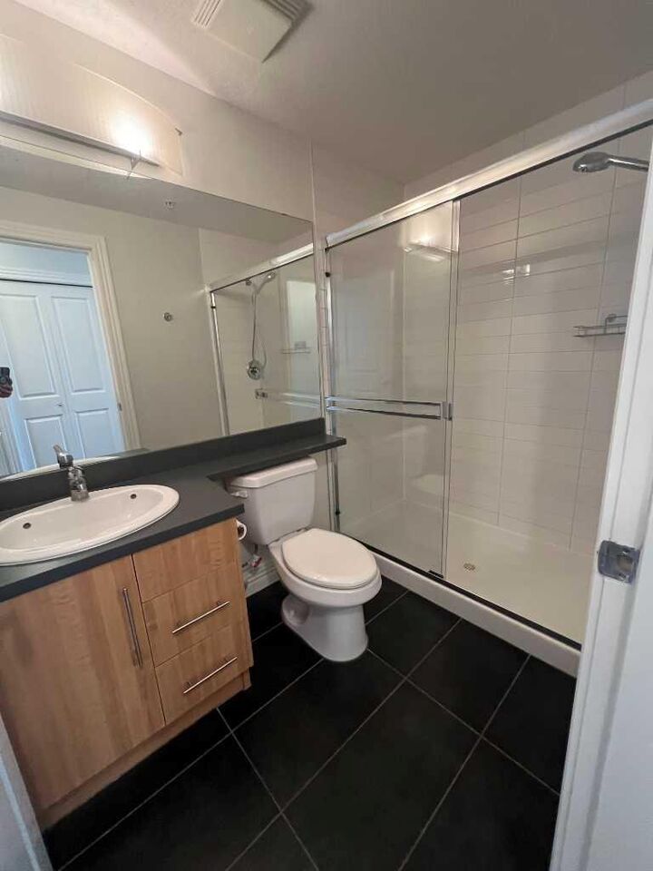 Property Photo: 55 Spruce Place SW 1003 AB T3C 3X6