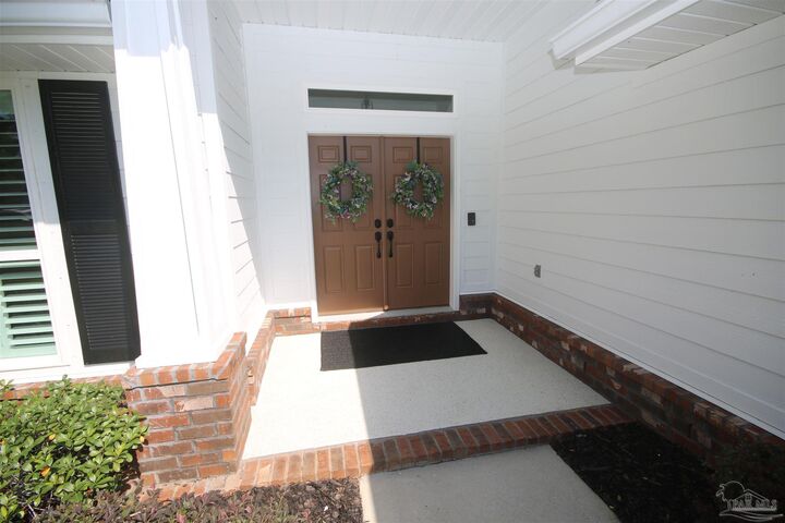 Property Photo:  6130 Dollarweed Dr  FL 32571 