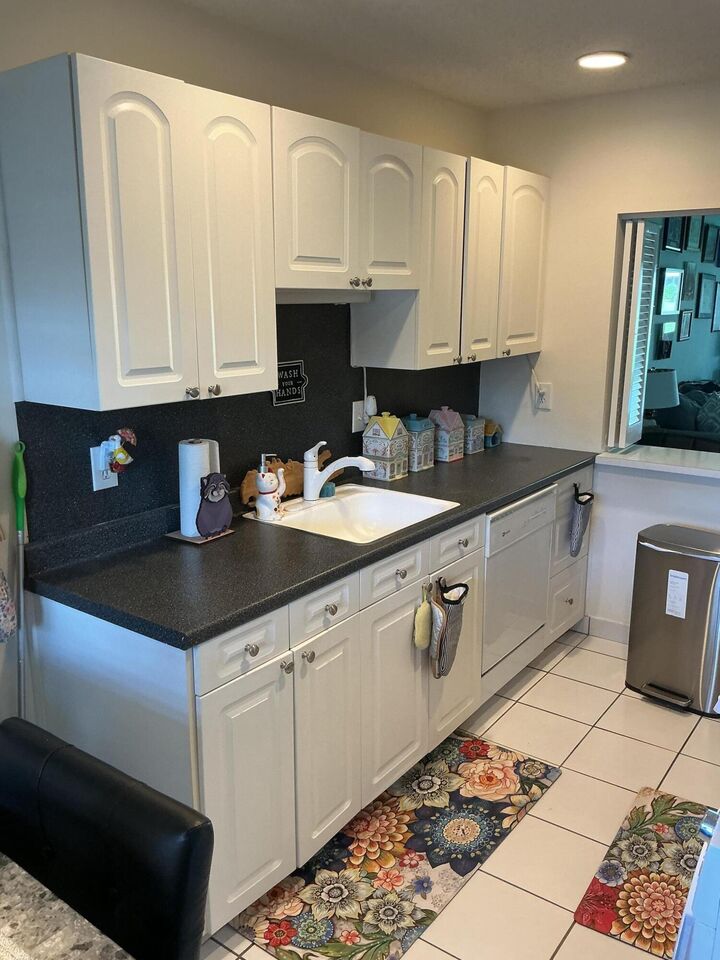Property Photo: 1580 NW 18th Avenue 98-B FL 33445