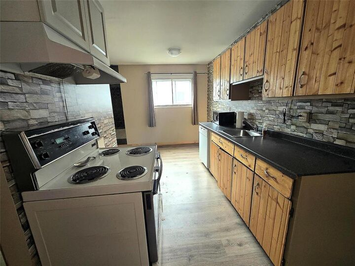 Property Photo:  1320 Aikins Street  MB R2V 2C6 