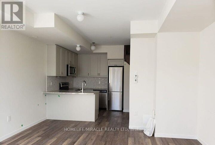 Property Photo:  1711 Pure Springs Boulevard 104  ON L1X 0E3 