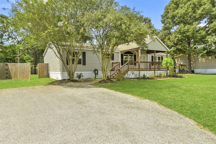 Property Photo: 31307 W Timberloch Trail TX 77355