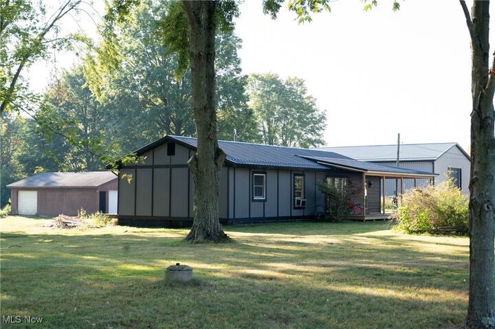 Property Photo:  6498 Stoddard Hayes Road  OH 44417 
