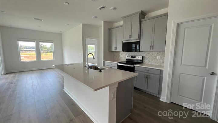Property Photo:  1410 Carthage Drive  NC 28144 