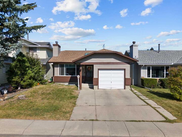 Property Photo:  12 Cedargrove Road SW  AB T2W 4T9 